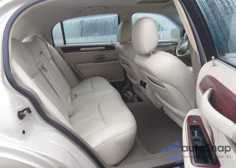 2003 Lincoln Town Car Cartier z USA, uszkodzony, nr VIN 1LNHM83W93Y652834